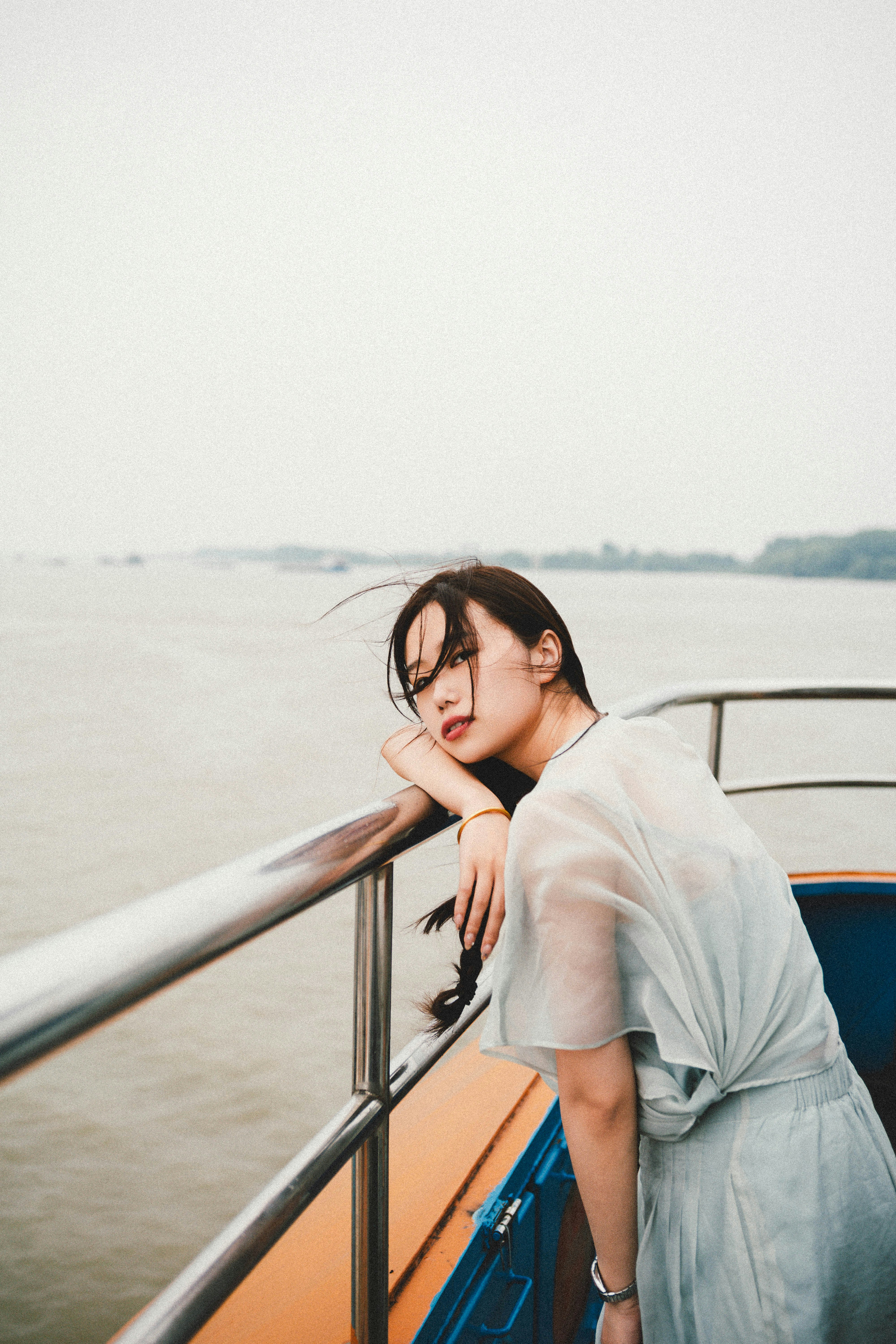 woman on a boat at sea